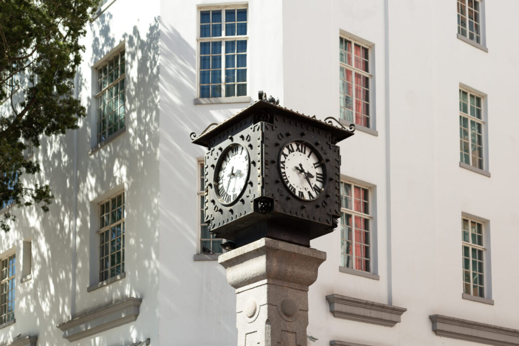 Iconic Central Avenue four-faced clock tower in San Jose, Costa Rica